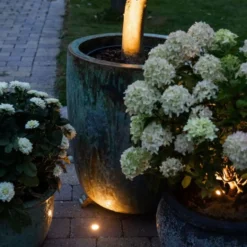 Light By Juhl holmegaardsten med Cosmos sort spot, 14x21x5,5 cm, grå